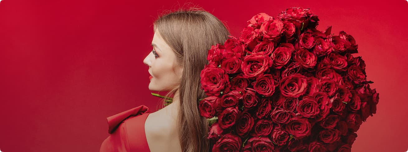 woman with large bouquet of flowers